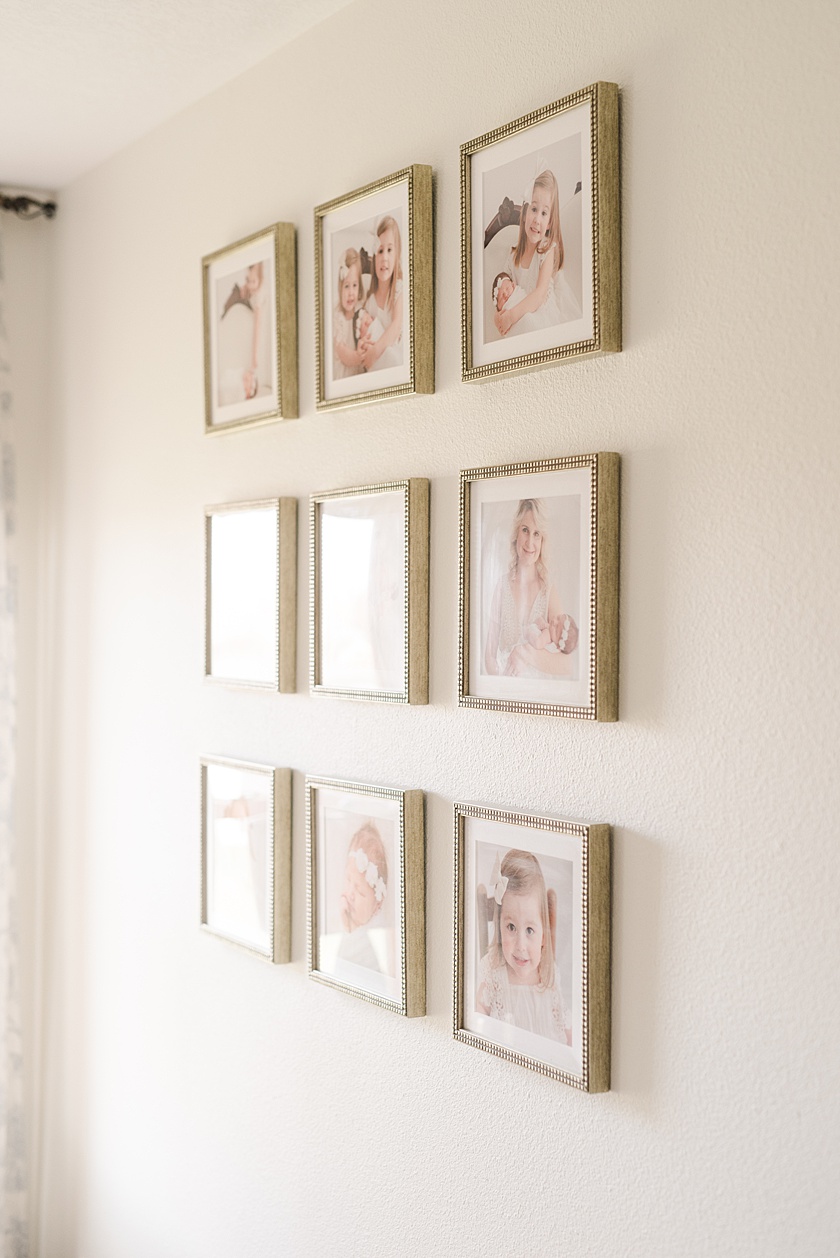 Three by Three Wall Gallery of 10 in by 10 inch square gold picture frames with white matting