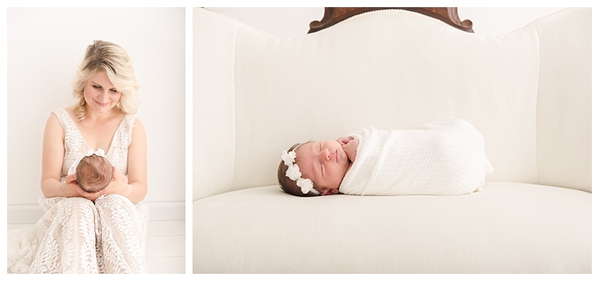 newborn baby girl lying on white settee wrapped and with white floral headband