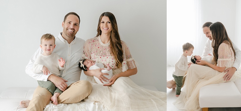 iowa city family holding newborn and big brother in photography studio