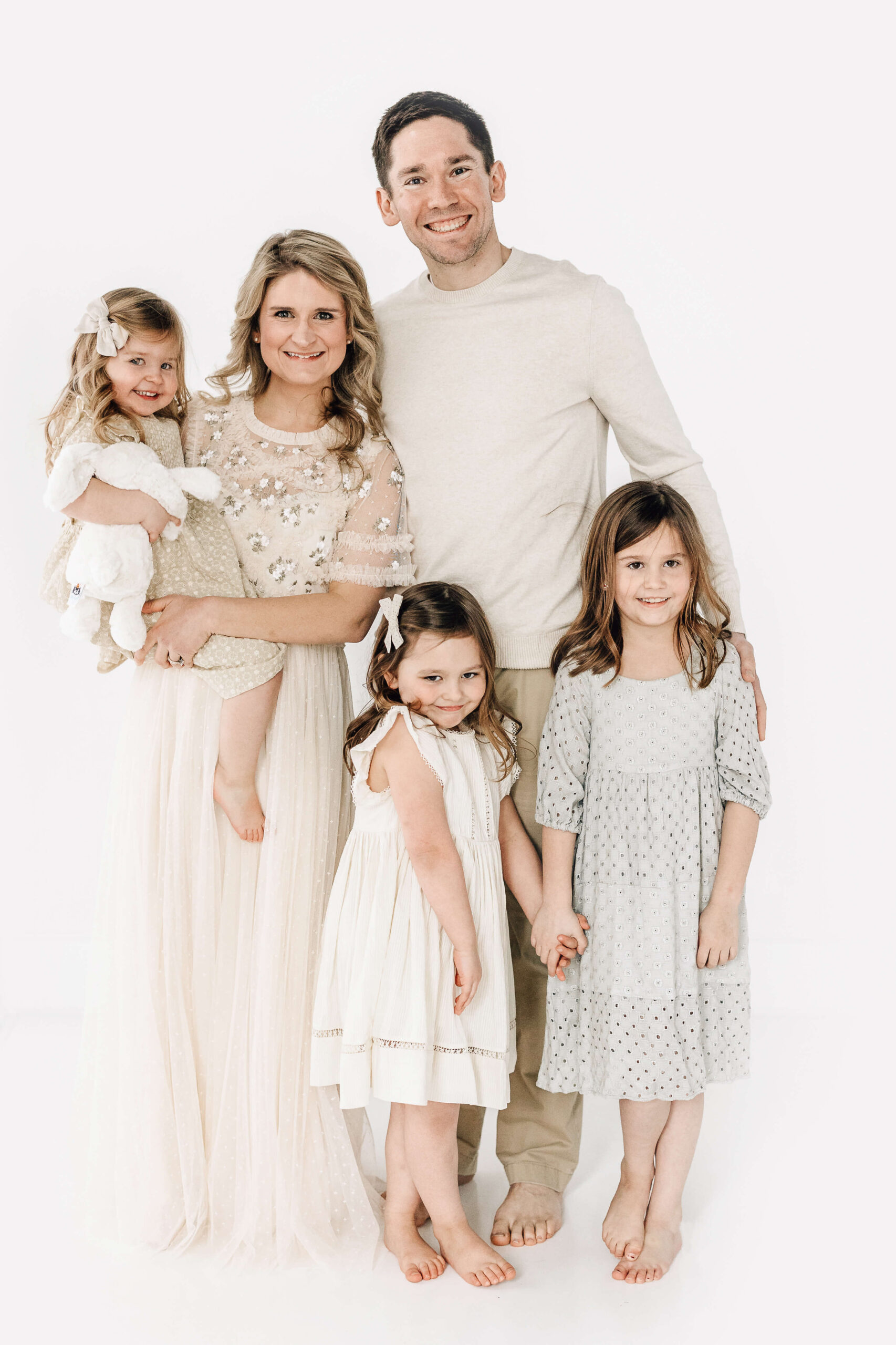 family portraits for family of 5 in light and airy studio
